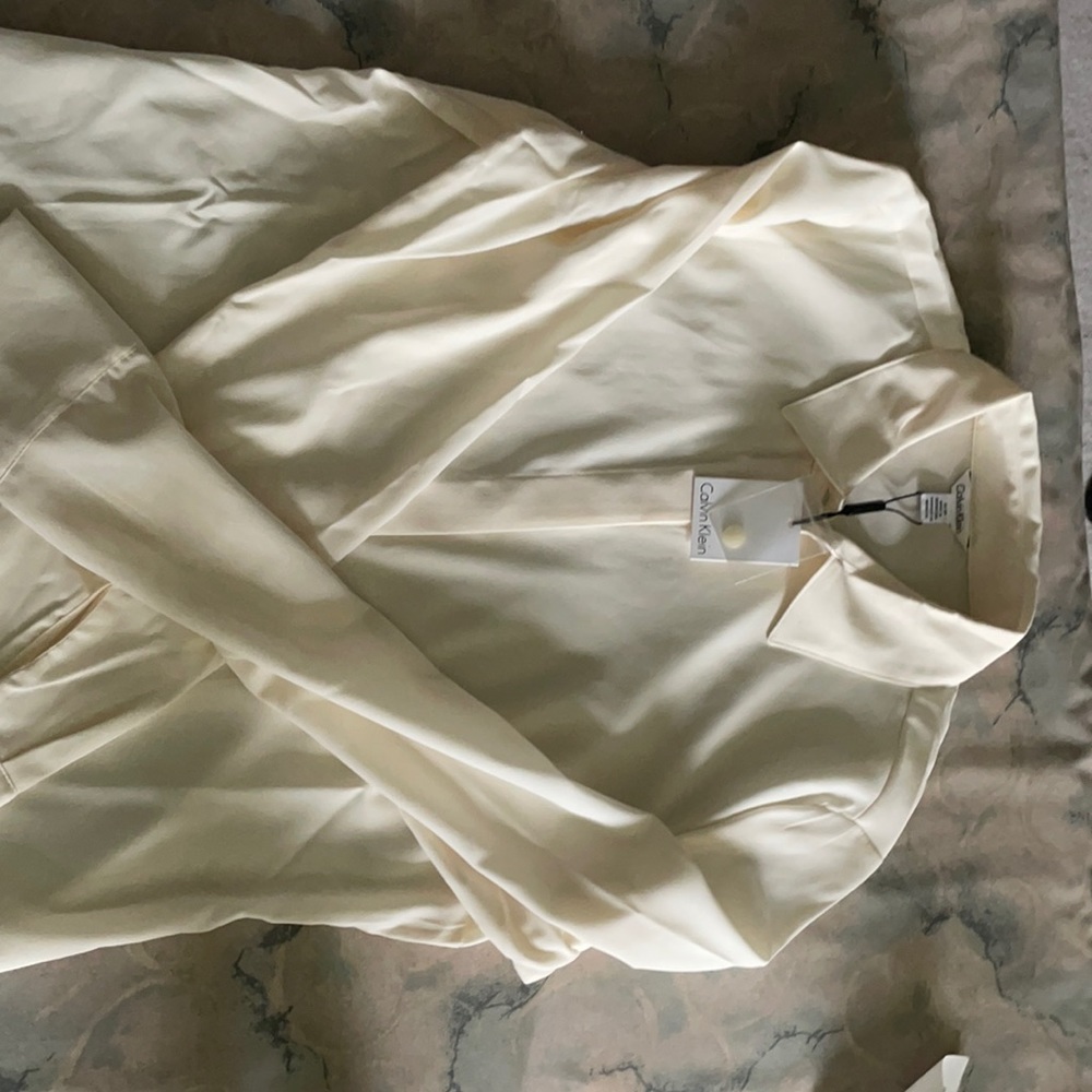 New with tags. Calvin Klein blouse.